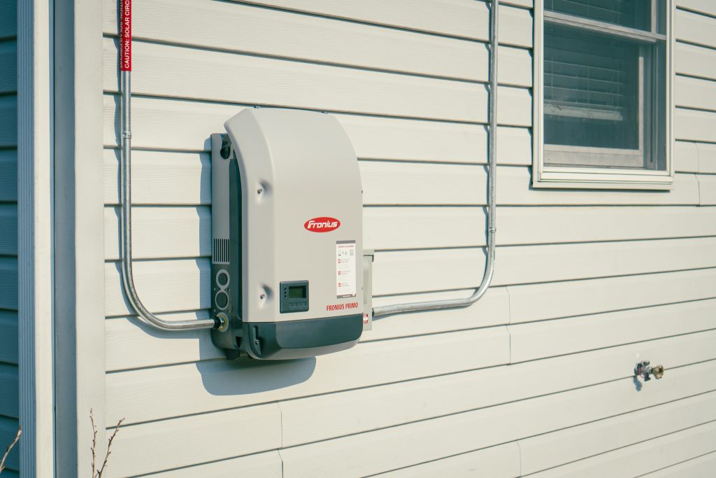 Fronius Solar Inverter on the side of a house