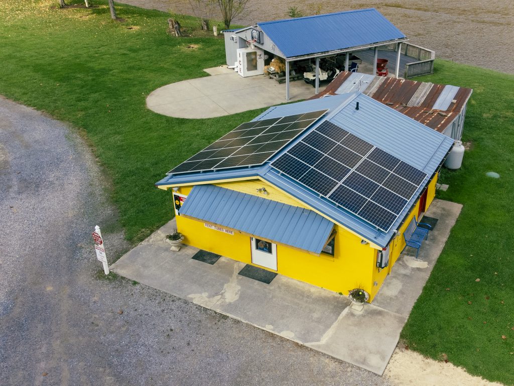 yellow building with solar at New River Junction