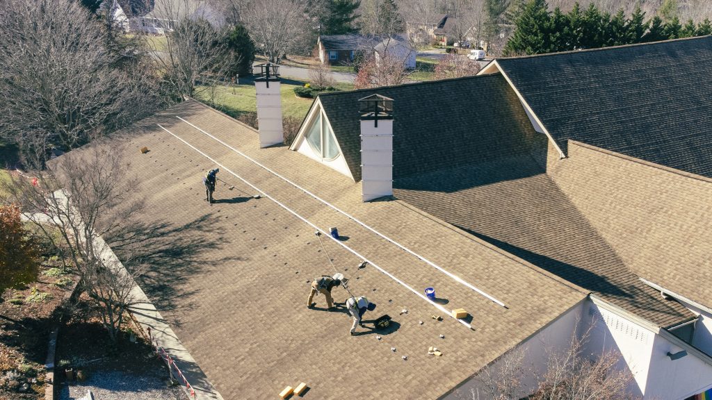 solar installers on a roof in Blacksburg, Virginia